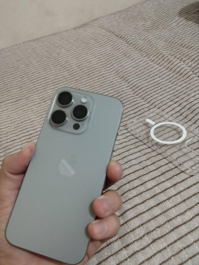 iPhone 15 Pro 128GB Titan — original charger included image 1